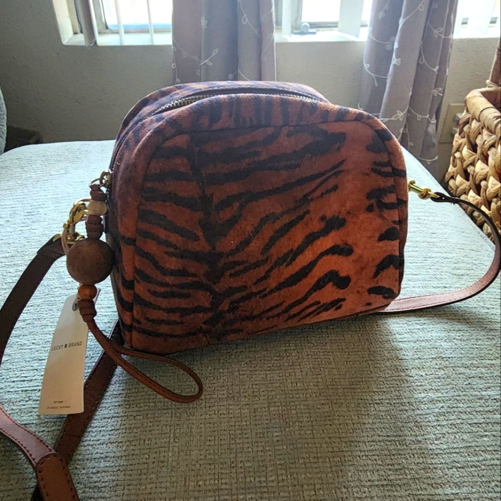 Brand new never before used genuine leather Lucky Brand zebra print crossbody